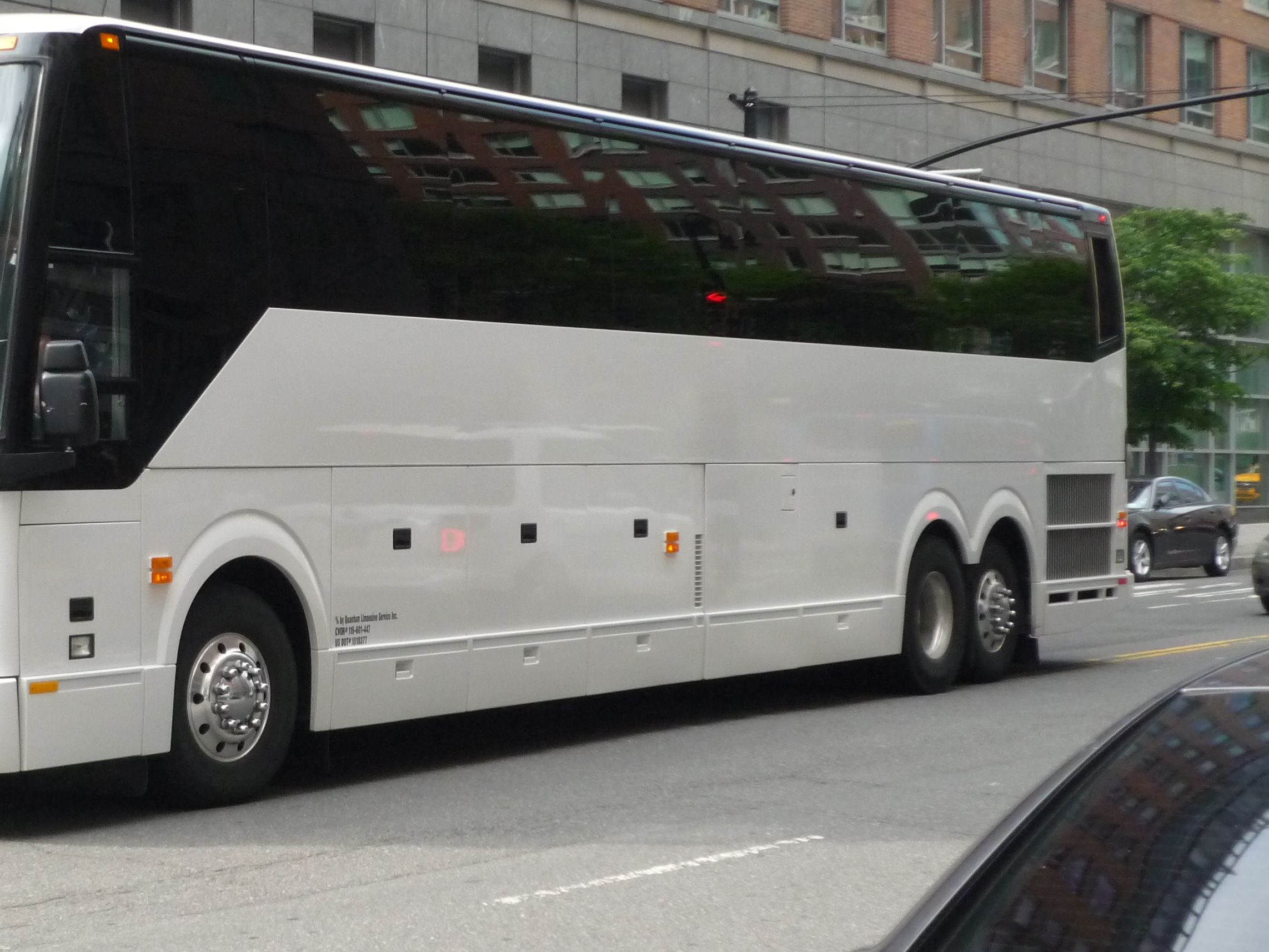 Prevost H3-45 motorcoach at the curb